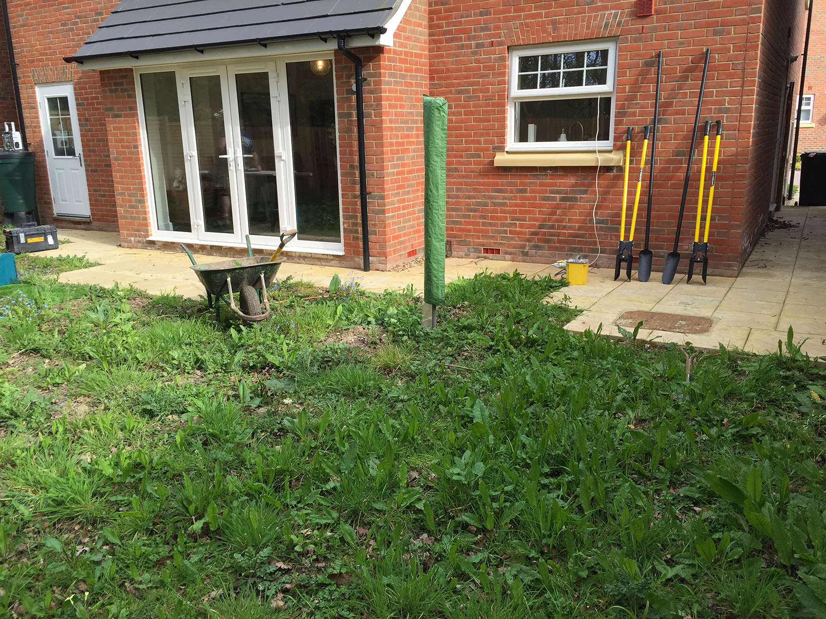 Artificial lawn laid adjacent to new decking
