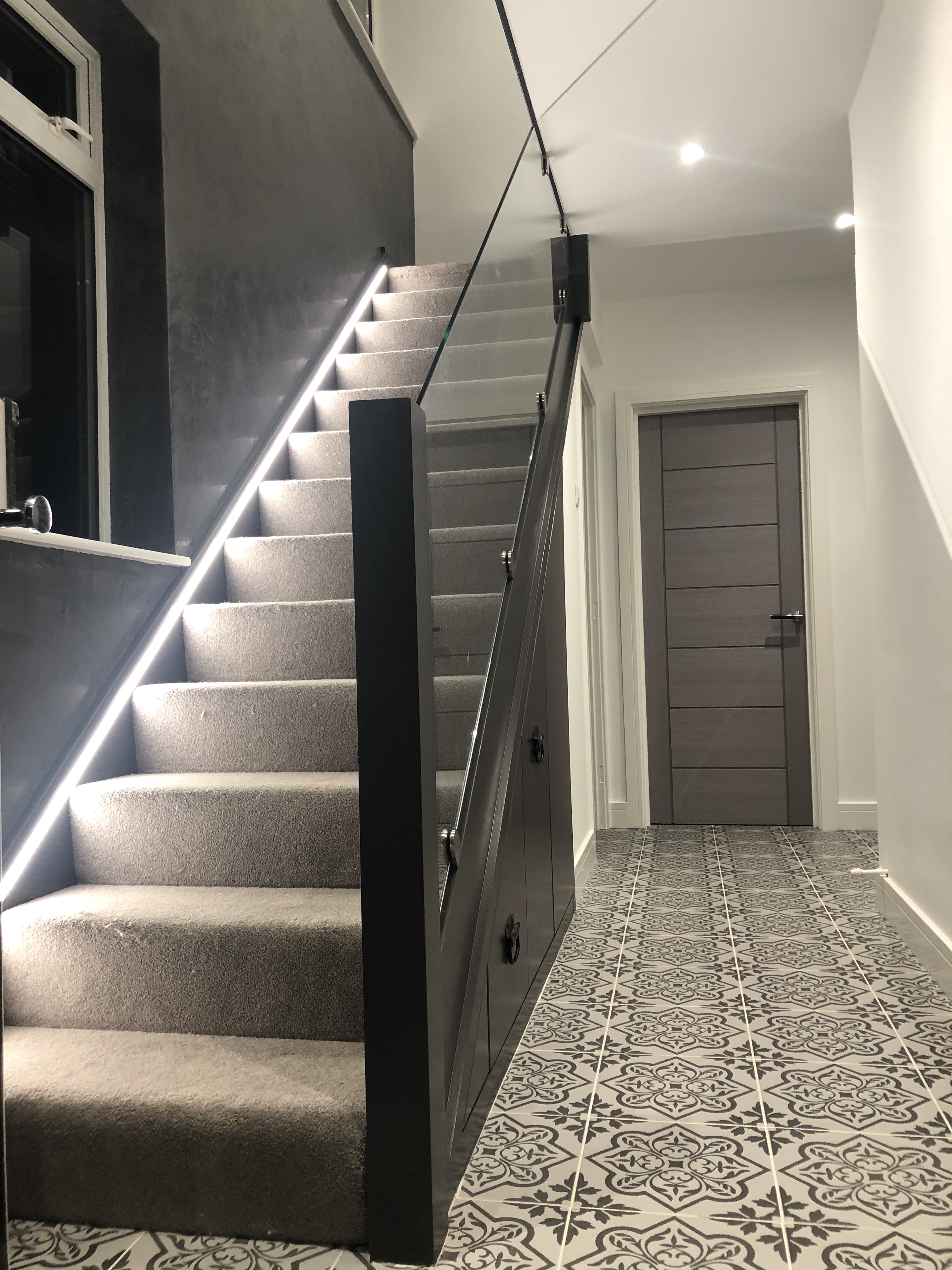 Stair and hallway refurbishment with glass balustrade